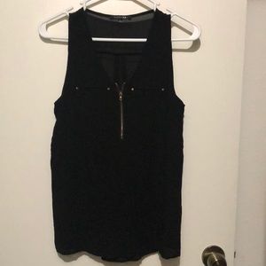 A rarely worn blouse, zipper works.